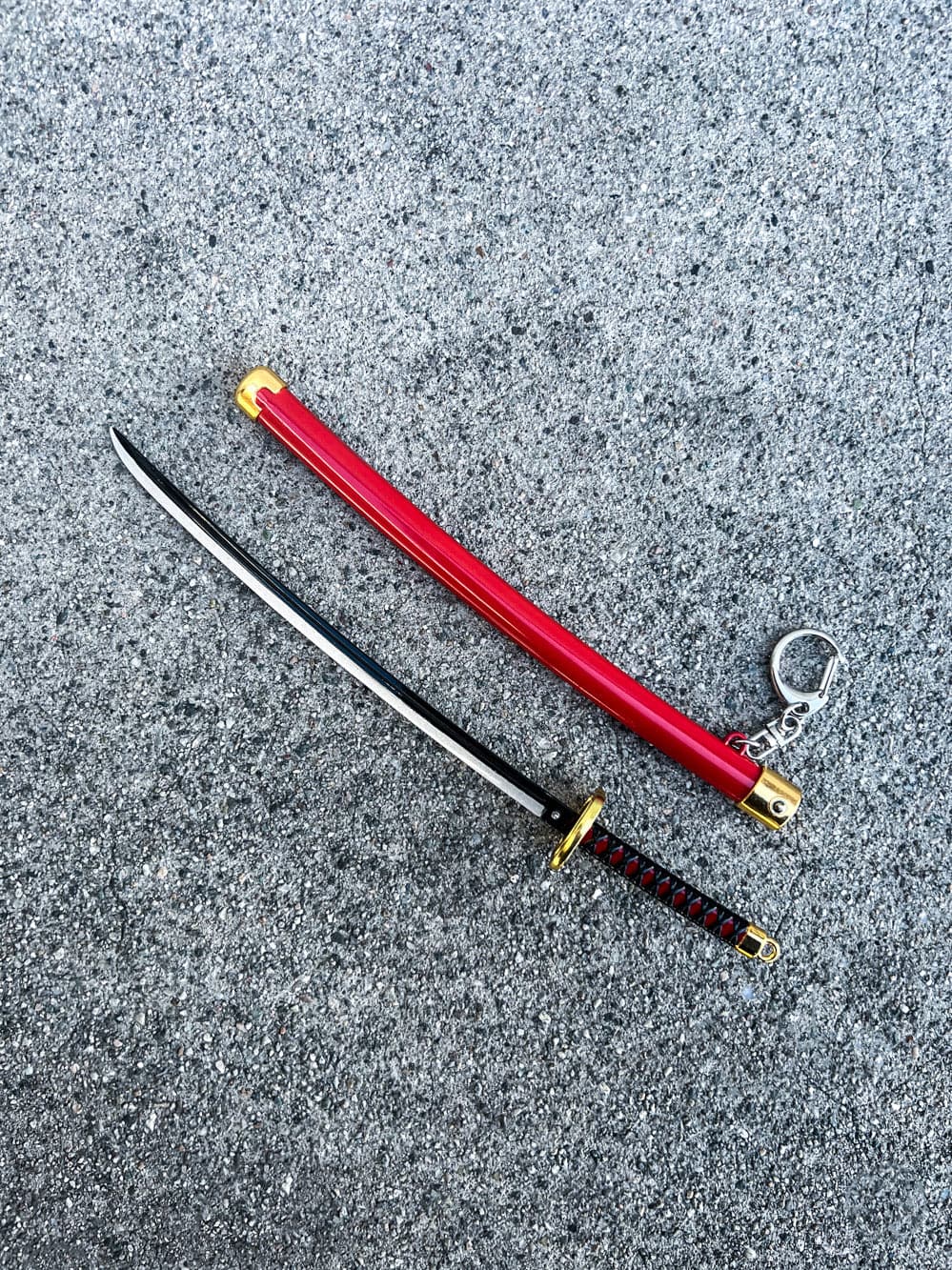 Genya Keychain + Stand