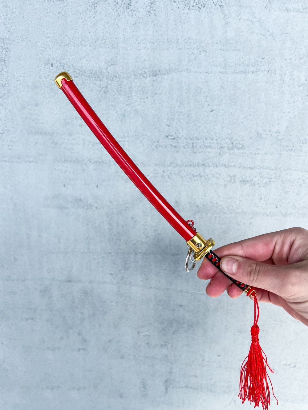 Genya Keychain + Stand