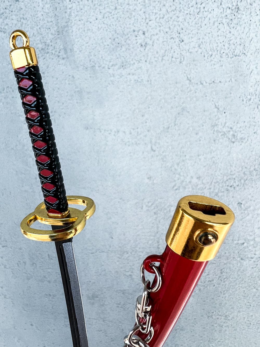 Genya Keychain + Stand